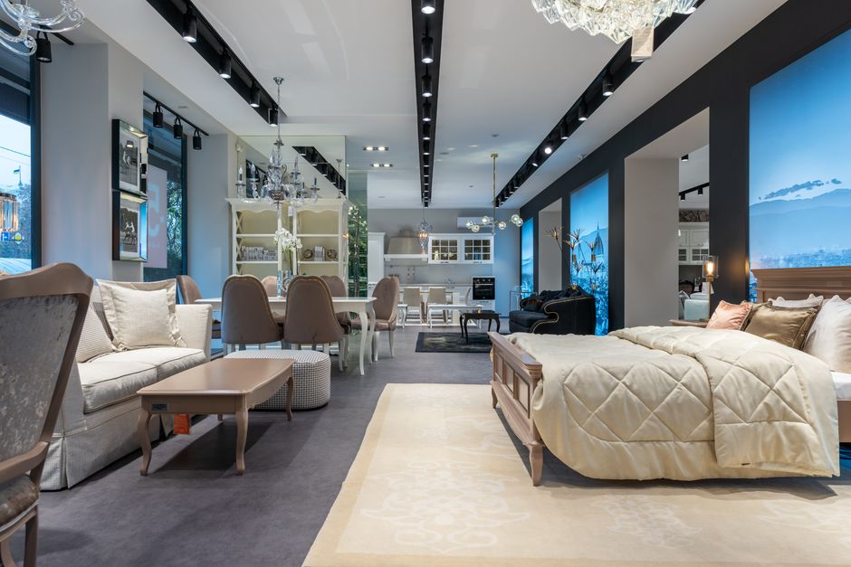 Interior view of a handmade furniture showroom displaying bespoke pieces